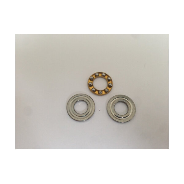 Washer and axial bearing for piston heads or spring guide